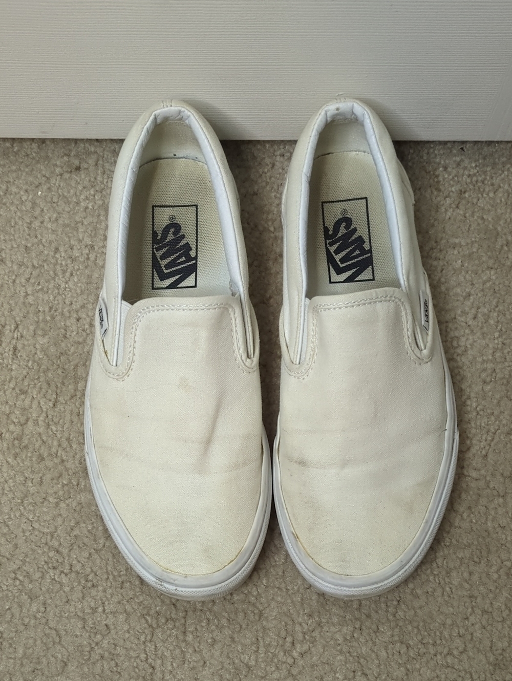 Vans Slip-On Canvas Sneakers in White